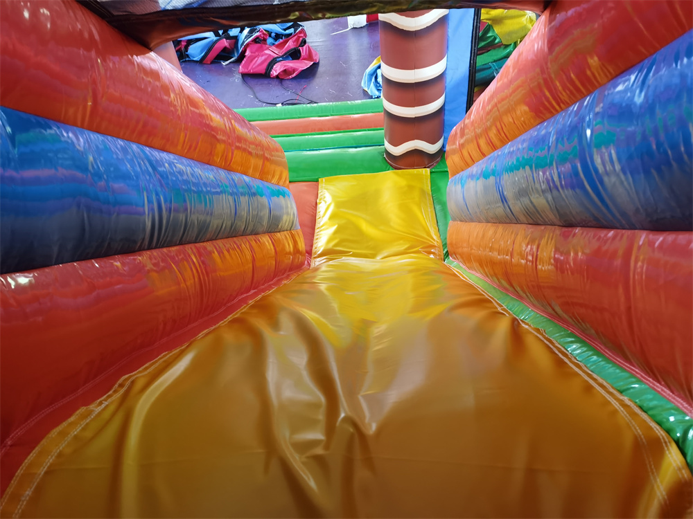  Hüpfburg - Mega Multiplay Dino - 6x6,5 m - mit Rutsche