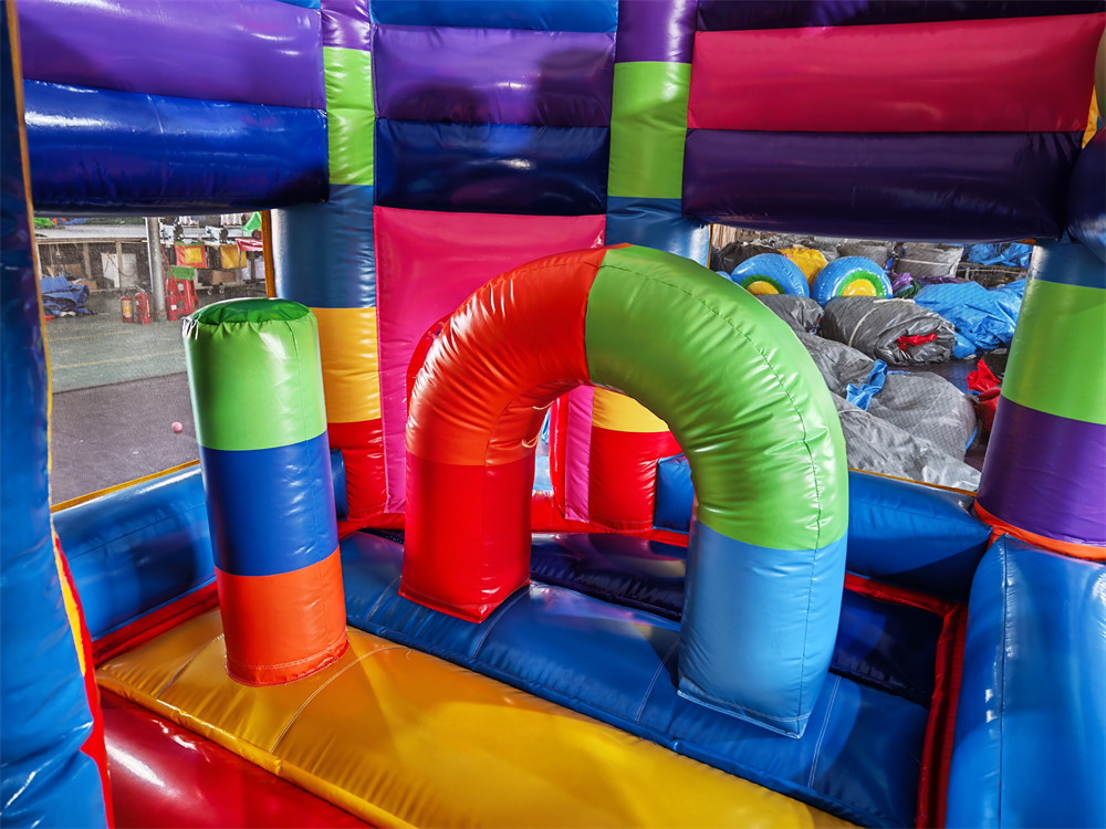 Hüpfburg 5x4,5 m - Bausteine - Rutsche seitlich